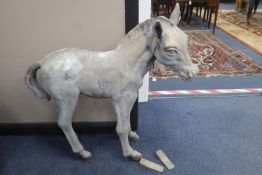 A reconstituted garden ornament of a foal, height 73cm