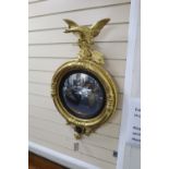 A Regency giltwood convex wall mirror, width 46cm, height 84cm