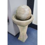 A marble ball on stand garden ornament, height 85cm