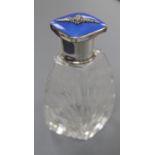 A George V silver and blue guilloche enamel mounted cut glass scent bottle, with R.A.F. applique,