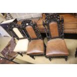 A set of nine Victorian Flemish style carved oak dining chairs