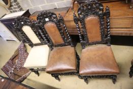 A set of nine Victorian Flemish style carved oak dining chairs