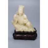 A Chinese soapstone figure of a Star God, wood stand, overall height 14cm
