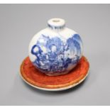 A 19th century Chinese blue and white snuff bottle and a similar dish, diameter 9cm