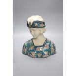 A French Art Nouveau style portrait bust, lady wearing head-dress, 26cmCONDITION: Structurally