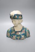 A French Art Nouveau style portrait bust, lady wearing head-dress, 26cmCONDITION: Structurally