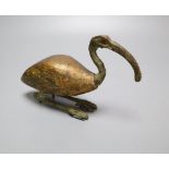 A bronze and wood model of an Ibis, the shaped body with heavy traces of gilt, the bronze head and