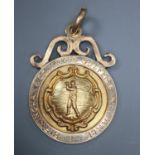 An early 20th century 15ct gold 'Birmingham Counties Golfing Alliance' medallion, 10.5 grams.