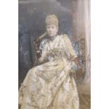 An Edwardian hand tinted photographic portrait of a seated lady, in ornate frame, image 29 x 24cm