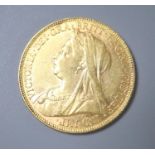An Edward VII 1901 gold sovereign.
