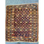 A Caucasian Kuba blue ground rug, 130 x 120cm