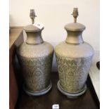 A pair of Indian embossed brass baluster shaped table lamps, height 50cm