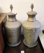 A pair of Indian embossed brass baluster shaped table lamps, height 50cm