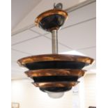 An Art Deco-style copper ceiling light