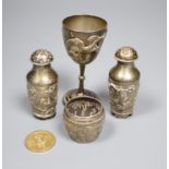 A pair of Chinese white metal pepperettes, 7cm, a similar salt, small goblet and a coin.