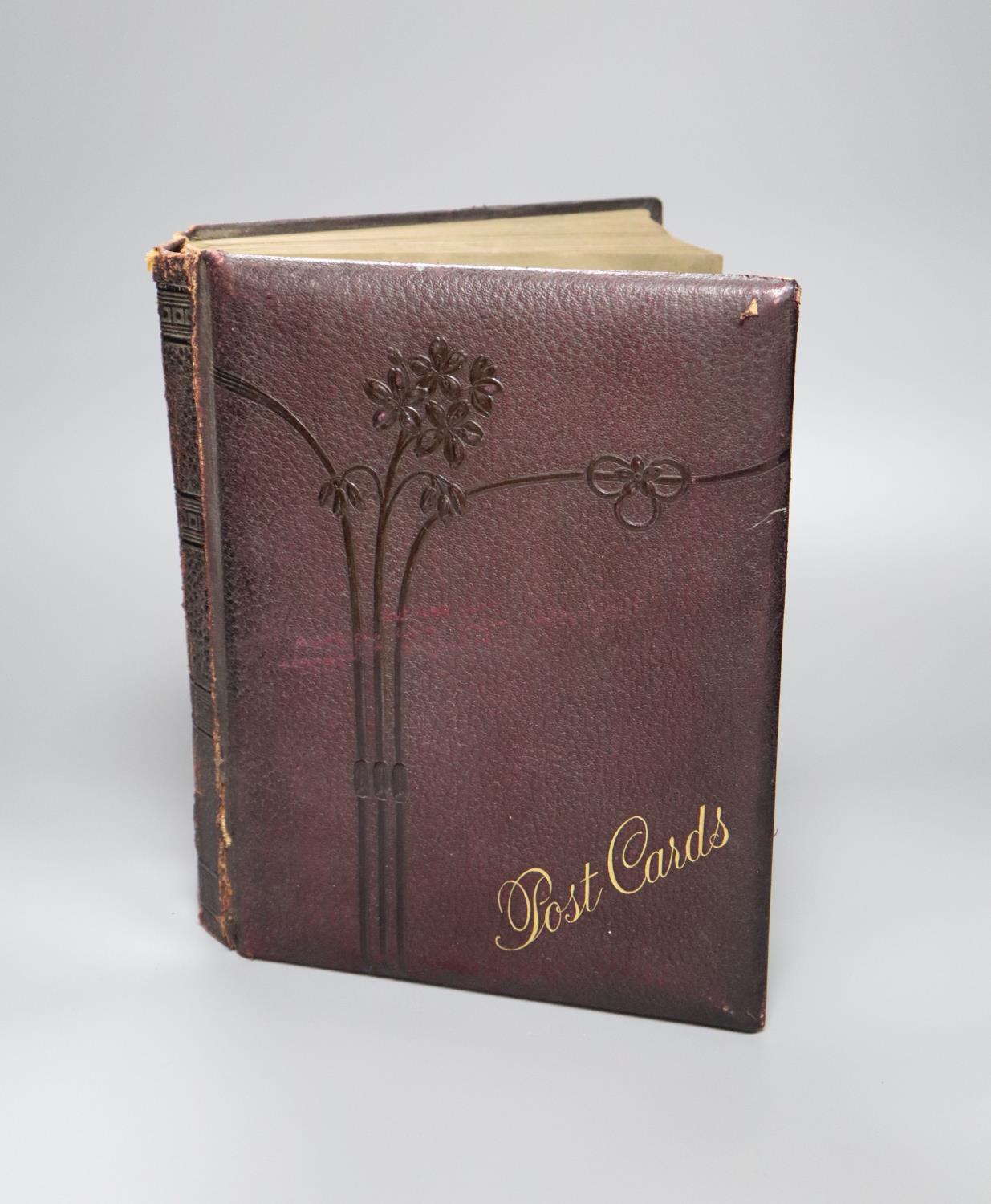 A Victorian leather bound postcard album, containing approximately 285 postcards, topographical