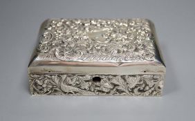 A late Victorian repousse silver mounted lidded rectangular box, with compartmental wooden interior,