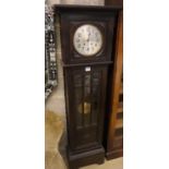A 1930's oak cased eight day striking longcase clock, 173cm high