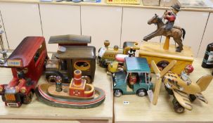 A collection of hand-crafted painted wooden toys, 1980's, comprising an automaton model of a