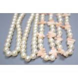 A single strand cultured pearl necklace, 127cm and a coral fragment and cultured pearl necklace,