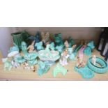 A group of Sylvac and other earthenware modelsCONDITION: One green seated terrier - right ear glue