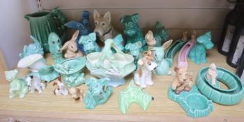 A group of Sylvac and other earthenware modelsCONDITION: One green seated terrier - right ear glue