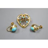 An Edwardian 15ct, turquoise and seed pearl set openwork heart shaped brooch, 22mm, gross 3 grams