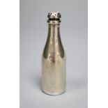 An Edwardian novelty silver pepperette, modelled as a Champagne bottle, Saunders & Shepherd,