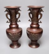 A pair of Chinese vases, dragon handles, height 33cm