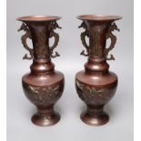 A pair of Chinese vases, dragon handles, height 33cm