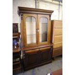 A pair of Victorian style mahogany bookcases, width 125cm, depth 50cm, height 218cm