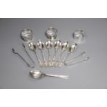 Three silver napkin rings, a set of six silver teaspoons, one other spoon and two pairs of silver