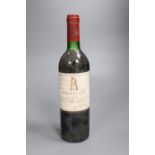 A bottle of Chateau Latour 1976, top shoulder