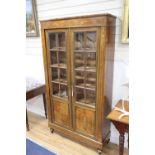 A 19th century French marquetry inlaid rosewood vitrine, width 100cm, depth 32cm, height 184cm