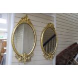 A pair of Victorian giltwood and gesso girandoles, width 46cm, height 80cm