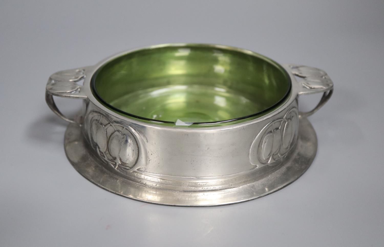 A Liberty's Tudric pewter and green glass butter dish, shape no.0163, diameter 16cm