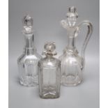 A Victorian cut glass claret jug and two decanters, tallest 34cmCONDITION: Mid-sized decanter with