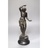 A 19th century bronze figure of a dancing bacchanal, indistinctly signed, 42cm high overall