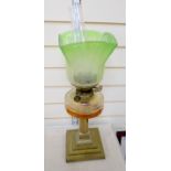 An Edwardian brass and glass oil lamp