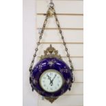 A late 19th century French wall clock, with floral-decorated blue ceramic frame, circular