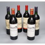 Two bottles of Chateau Cure Bon La Madeleine, 1983, two Chateau Cadet-Piola, 1986 and two bottles of