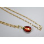 Victor Meyer for Faberge, an 18ct yellow gold and enamel 'ladybird' pendant set with diamond eyes (