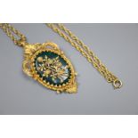 A 1970's 9ct gold and chrysophase set oval flower and scroll pendant brooch, on a multi-link 9ct