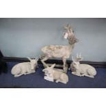 Four reconstituted stone deer garden ornaments, largest 88cm high