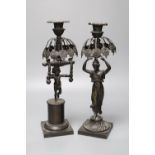 Two early 19th century bronze figural candlesticks (lacking glass lustres), 37.5cm