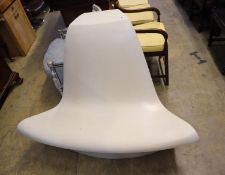 A 1960's white plastic chair