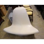 A 1960's white plastic chair