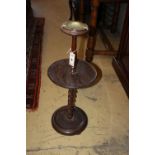 An early 20th century oak smoker's stand, with ashtray, height 70cm