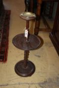 An early 20th century oak smoker's stand, with ashtray, height 70cm