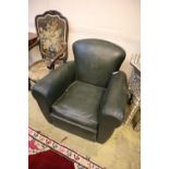 A deco style green leatherette armchair